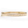 14KY 0.70CTW DIAMOND BANGLE - 9 STONE CENTER ROW - Norma's Jewelry