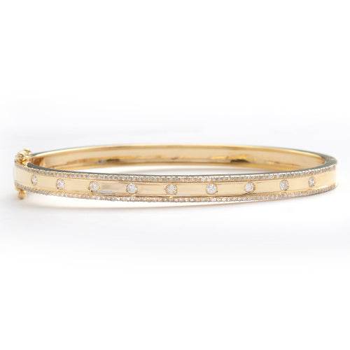 14KY 0.70CTW DIAMOND BANGLE - 9 STONE CENTER ROW - Norma's Jewelry