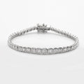 14KW 6.00CTW EMERALD DIAMOND BEZEL SET GRADUATED - Norma's Jewelry