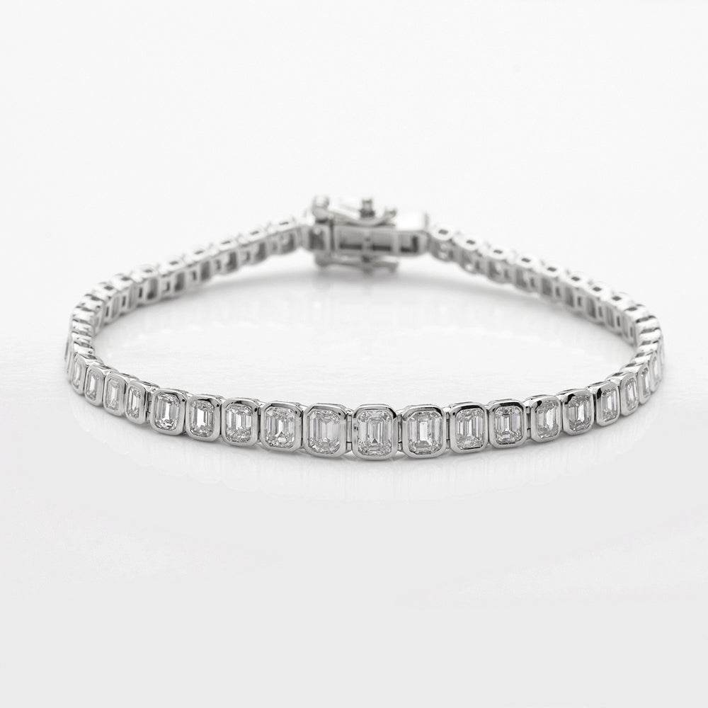 14KW 6.00CTW EMERALD DIAMOND BEZEL SET GRADUATED - Norma's Jewelry