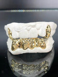 8 Teeth Gold Grillz - 2 Tops & 6 Bottoms (Starburst w/ Back Bridge) - Norma's Jewelry