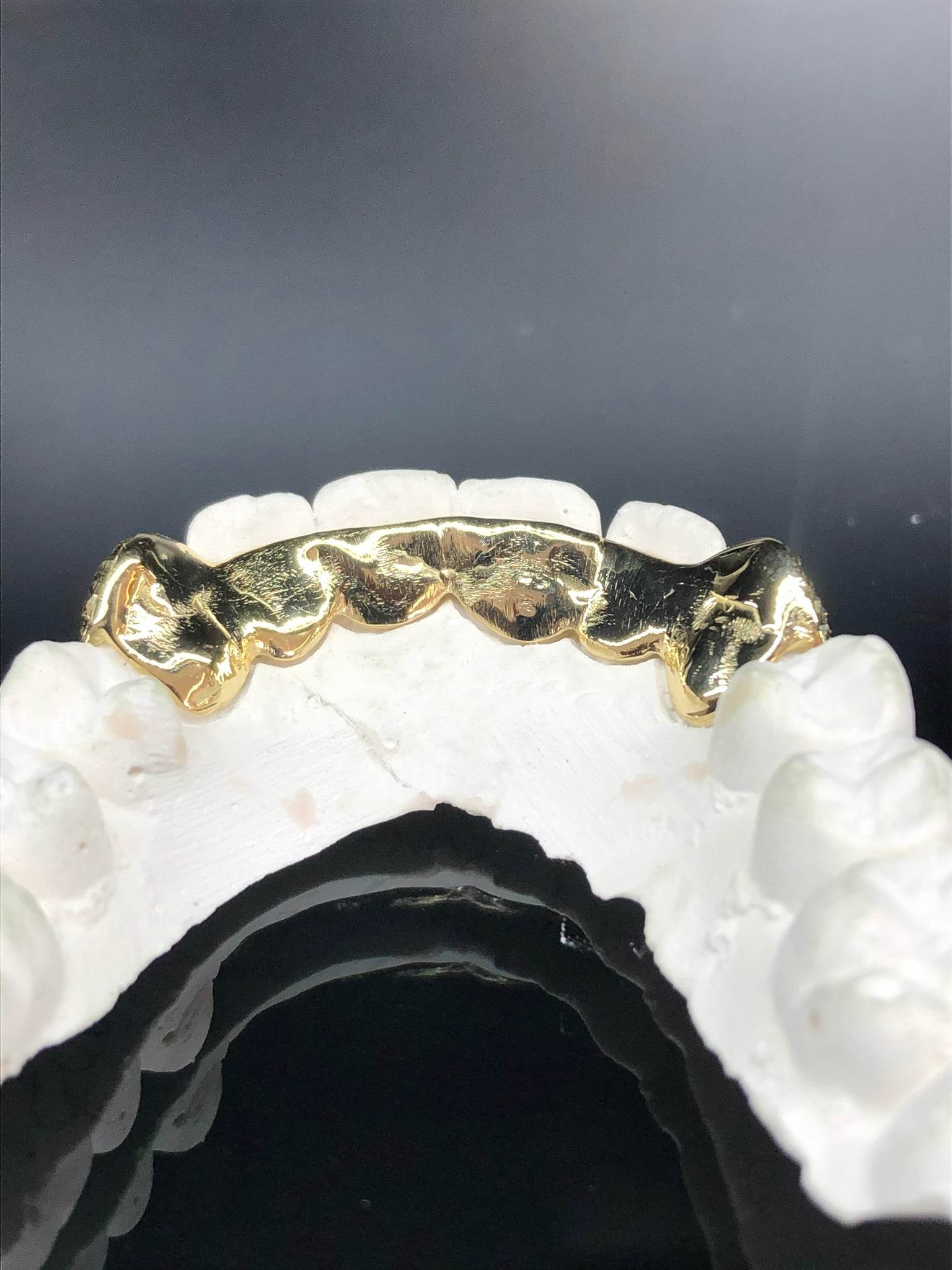 2 Teeth Gold Grillz - 2 Bottom Fangs w/ Back Bridge - Norma's Jewelry