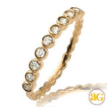 14KY 0.25CTW DIAMOND BEZEL SET 10 STONE BAND - Norma's Jewelry